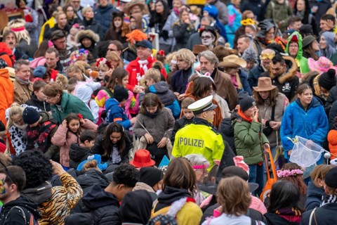 Rose Monday parade in Düsseldorf, police officers on duty at the street carnival, North
