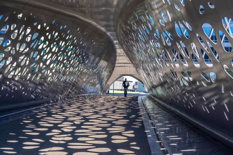 Light effects from the sun in the Parkbruk, a cycle and pedestrian bridge in the city centre of