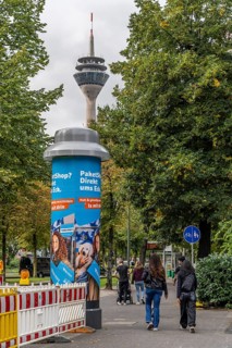 Advertising pillar with 5G mobile phone antenna in the roof of the advertising pillar, over 50 of