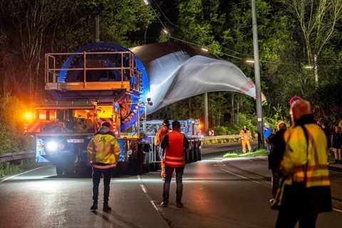 Transport of a 68 metre long, 22 tonne blade of a wind turbine, here in Schwelm, with a
