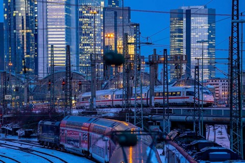 Railway tracks in front of the main station of Frankfurt am Main, ICE train, skyline of the