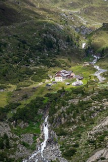 View of mountain hut Berliner Hütte with Zemmbach stream in the Zemmgrund valley, Berliner