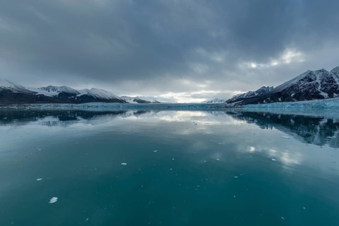 Mountains and glacier edge of Monacobreen, Liefdefjord, Woodfjord area, Spitsbergen Island,