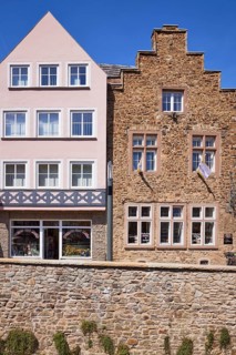 Historic sandstone house and wall in Bad Münstereifel, Eifel, Euskirchen district, North