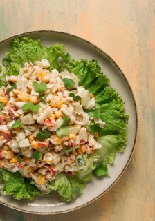 Canned corn salad, with crab sticks, top view, no people
