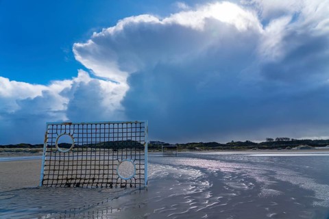 Football pitch, football field, Tor tor, on the beach, tidal creek, in the west of Borkum, island,