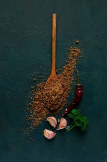 Svan salt, wooden spoon, garlic, red hot pepper, herbs and spices, Georgian cuisine