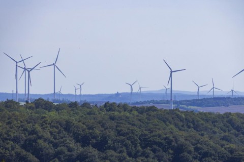 Neukirchen wind farm near Eisenach. with distant view of Wartburg Castle, Nazza, Thuringia,