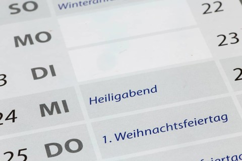 Close-up of a calendar section with the 2025 Christmas holidays