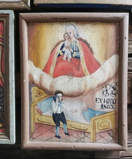Votive pictures, votive tablets on the walls of the chapel of grace inside the church, pilgrimage