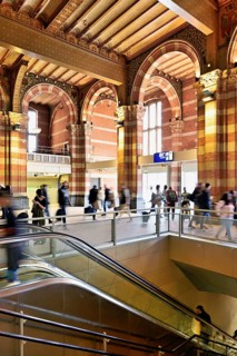 Interior view of Centraal Station, Central Station with flag, Amsterdam, Netherlands