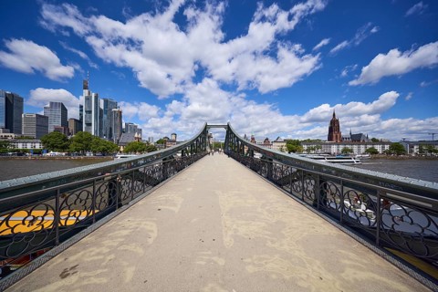 Iron footbridge with a view of the Mainkai and the skyscrapers in Frankfurt am Main, Hesse,