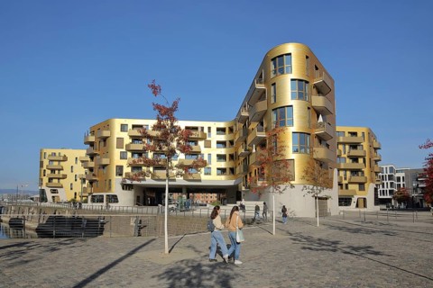 Modern golden building Pandion Doxx, golden, residential complex, pedestrian, customs harbour,
