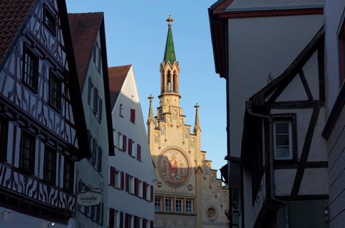 Old town alley with view of the Hospital of the Holy Spirit, neo-Gothic façade, Bad forest lake,