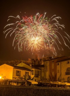 Fireworks from the Scaliger castle in the foreground Houses of, Borghetto, Valeggio sul Mincio,