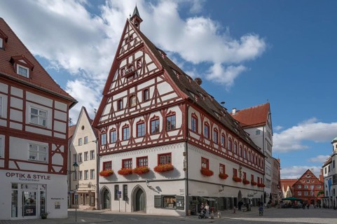 Former dance house with bread house, now municipal administration building, built in 1443,