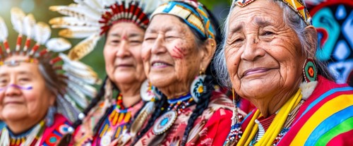 Smiling native indigenous people of Canada dressed in colorful native clothes, AI generated