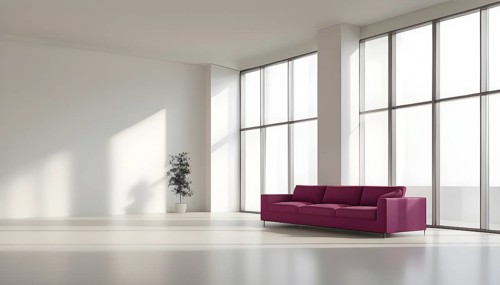 Minimalist living room with clean lines and neutral tones, featuring a modern magenta colored sofa,