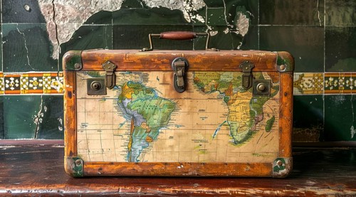 Concept of readiness for travel. Travel bag with world map, AI generated