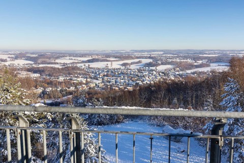 View from the Glückauf Tower of snow-covered Oelsnitz in the Ore Mountains, Saxony, Germany, Europe