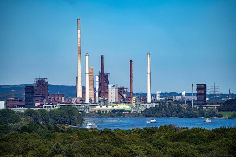 View across the Rhine to the Thyssenkrupp Steel steelworks in Duisburg-Beeckerwerth, blast
