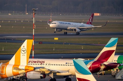 Düsseldorf Airport, Turkish Airlines aircraft landing, Condor and Eurowings Airbus on the apron,