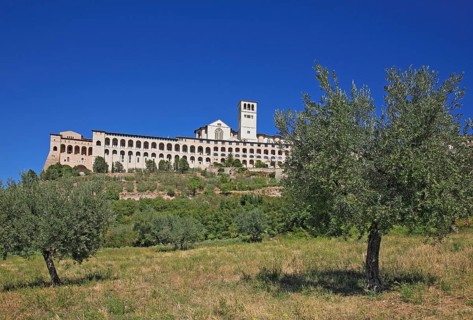 Basilica of San Francesco and monastery seen from the valley, Assisi, Umbria, Italy, Europe