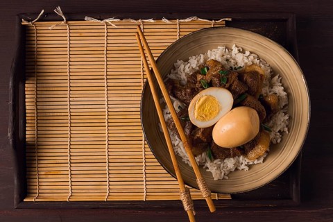 Stewed eggs, with pork belly, and rice, chinese food, homemade, selective focus, rustic, no people
