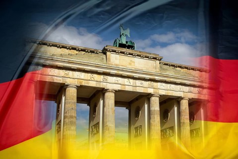 Brandenburg Tor in Berlin on a German flag (Composing)