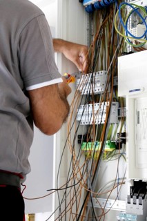 Professional electrical installation on a building shell