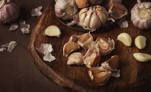 Fresh garlic, on a dark background, top view, food concept