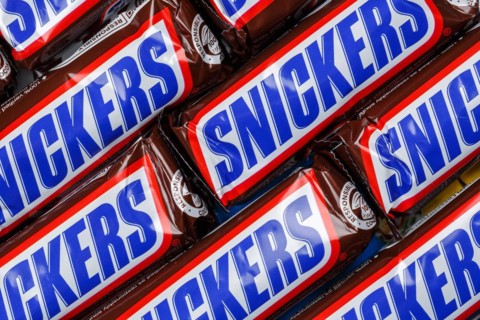 Snickers bar chocolate bar from Mars Inc. as background