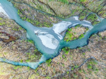 The widely branching arms of river Jostedalsola, a glacial river originating in the Jostedalsbreen