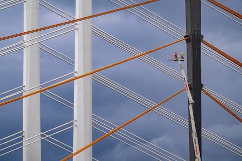 The new Rhine bridge Neuenkamp, the A40, white pillar ropes, and the old motorway bridge, which is