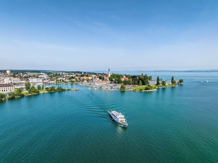 Harbour area, ferry port, yacht harbour, marina of Romanshorn with Seepark, and the departing