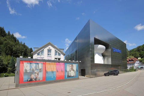 Modern building of Duravit-AG with oversized toilet bowl, oversize, XXL, size comparison, car,