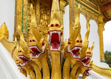 Naga at the steps of Wat Ho Pha Bang temple, Royal Palace, Luang Prabang, Laos, Asia