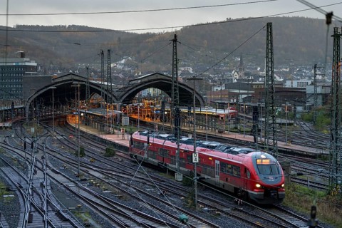 The main railway station of Hagen, station halls, tracks, platforms, regional express train, North