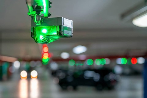 Underground car parks, multi-storey car parks, red or green lamps on the ceiling, show drivers