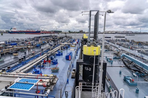 Inland tankers waiting for new cargo, in the petroleum harbour, seaport of Rotterdam, Maasvlakte,