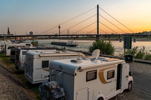 Skyline of Düsseldorf on the Rhine, Rhine Tower, Oberkassler Bridge, motorhome pitch on the banks