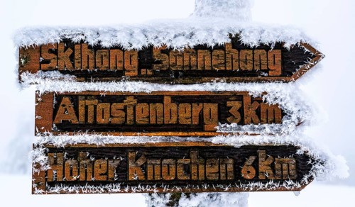 Signposts, hiking signs, winter in the Sauerland, Hochsauerlandkreis, at Kahler Asten, near