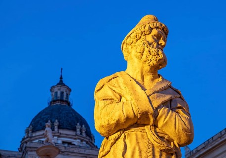 Statue of Praetorian Fountain and the dome of Santa Caterina church by night, Piazza Pretoria,