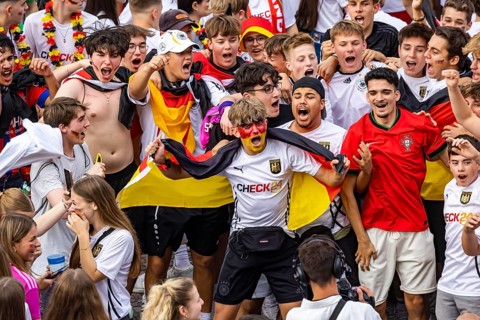 UEFA European Football Championship. Enthusiastic fans at the public viewing in the host city of