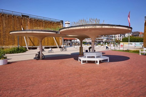 Seating areas with sunshades and graduation tower in the Bad Salzuflen park, Lippe district, North