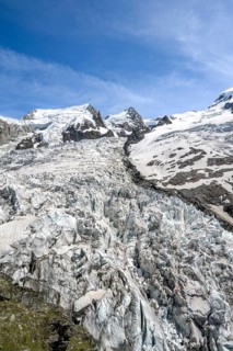 High alpine glaciated mountain landscape, La Jonction, Glacier des Bossons meets Glacier de