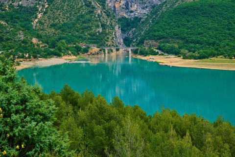 Mountain landscape with the Lac de Sainte-Croix reservoir and tree-covered slopes, summer, Lac de