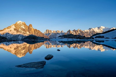 Evening mood, mountain landscape at sunset, alpenglow, water reflection in Lac Blanc, mountain