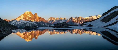 Evening mood, mountain landscape at sunset, alpenglow, water reflection in Lac Blanc, mountain