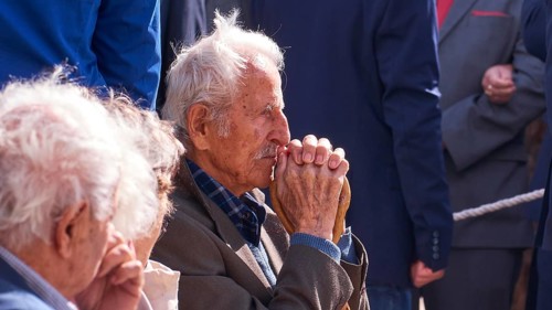 Survivors of the massacre of 3.6.1941, Thoughtful elderly man in a conversation in autumnal
